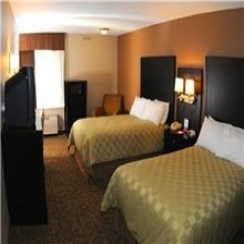 Double Queen Bedroom at Ramada by Wyndham Fresno